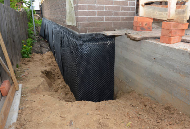 Happy homeowners after waterproofing job in Cresskill